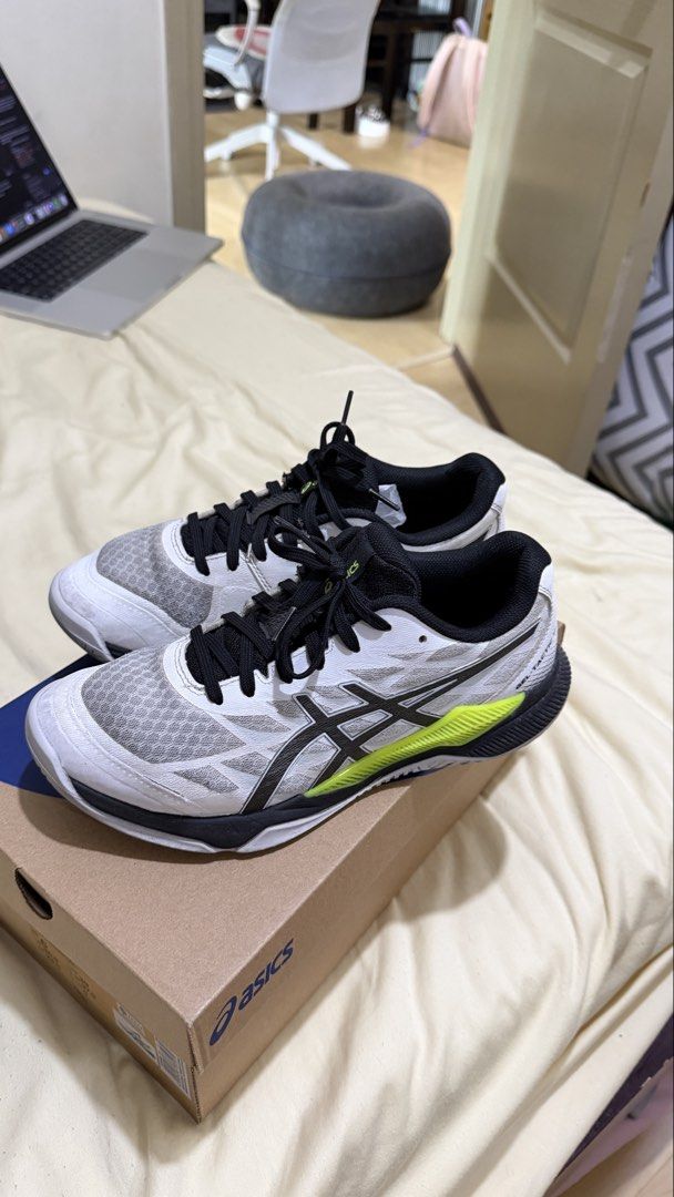 ASICS Gel Tactic Court Shoes (Category: Casual Shoes) located in Mandaluyong City. Submitted by arrianeli92735 (Listing ID 1461647876, Image 3). Description: - Brand: ASICS - Model: Gel Tactic Court Shoes - Size: US 6 Men / 7 for Women - Color: White with black and neon yellow details - Suitable for court sports - Features ASICS GEL cushioning for comfort and shock absorption - Durable construction for stability and support - Meetup available at 