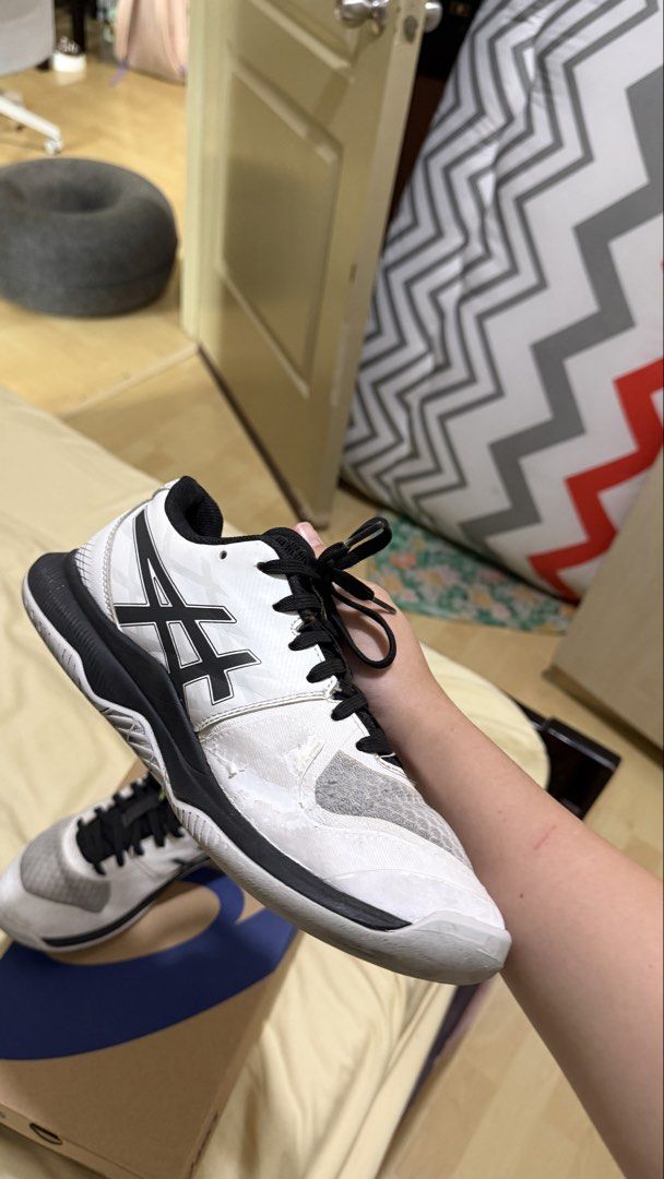 ASICS Gel Tactic Court Shoes (Category: Casual Shoes) located in Mandaluyong City. Submitted by arrianeli92735 (Listing ID 1461647876, Image 2). Description: - Brand: ASICS - Model: Gel Tactic Court Shoes - Size: US 6 Men / 7 for Women - Color: White with black and neon yellow details - Suitable for court sports - Features ASICS GEL cushioning for comfort and shock absorption - Durable construction for stability and support - Meetup available at 