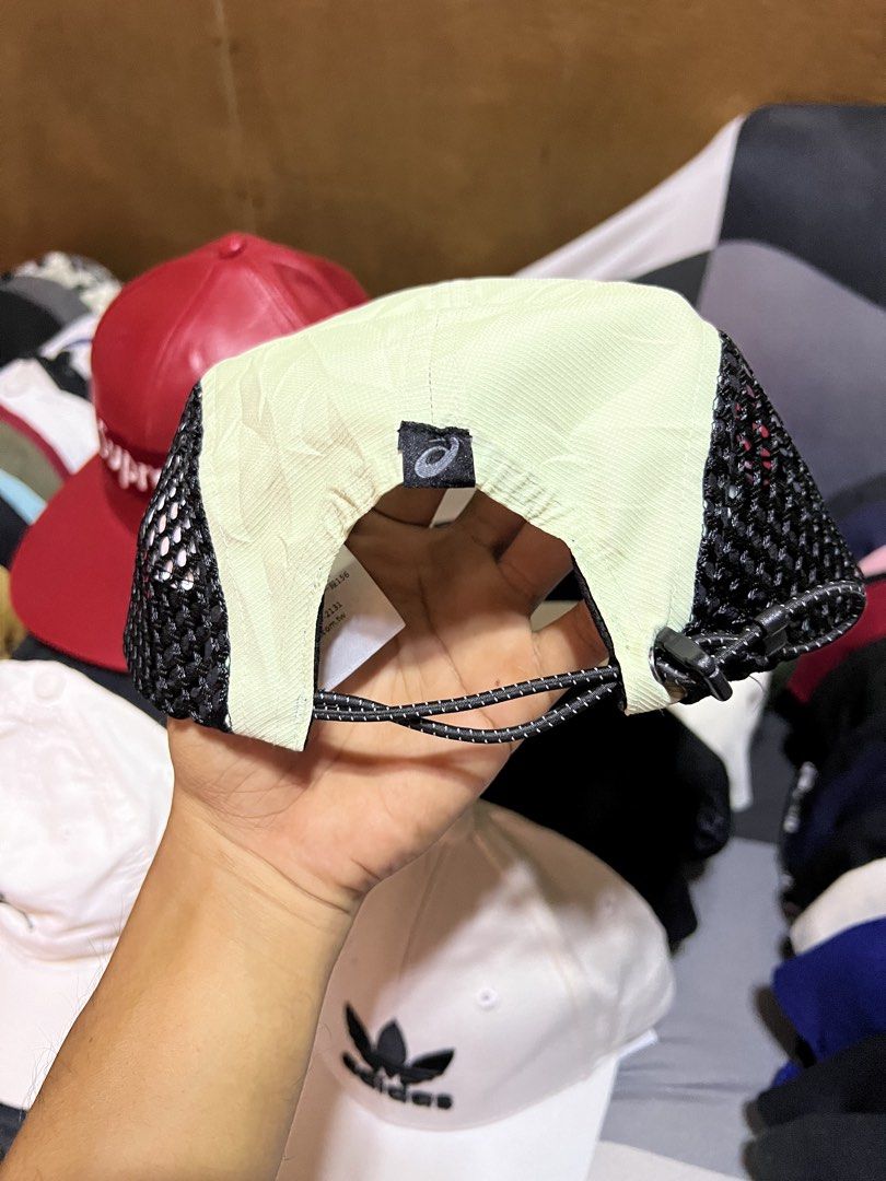 Asics Light Green Mesh Running Cap (Category: Caps & Hats) located in Davao. Submitted by dubdabi.co (Listing ID 1461779765, Image 3). Description: - Light green Asics cap - Black mesh sides - Adjustable strap at the back - Ideal for running or everyday wear - Prominent Asics logo on the front - Includes inner tag.
