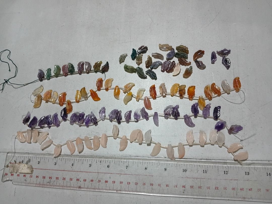 Assorted Gemstone Leaf Beads for Jewelry Making (Category: Necklaces) located in Marikina City. Submitted by my-an (Listing ID 1461655552, Image 3). Description: - Assorted leaf-shaped gemstone beads. Detailed carved leaves (Top/Side-Drilled) - Includes Rose Quartz, Amethyst, Agate, and Green Aventurine - Perfect for making bracelets, necklaces, and other crafts - Great for DIY jewelry and craft projects Brand new but old stock. Left-over from pr