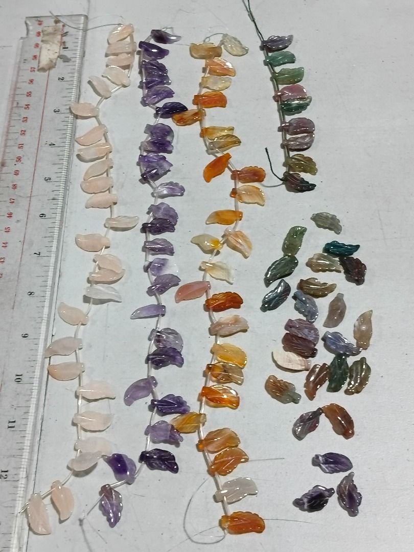 Assorted Gemstone Leaf Beads for Jewelry Making (Category: Necklaces) located in Marikina City. Submitted by my-an (Listing ID 1461655552, Image 2). Description: - Assorted leaf-shaped gemstone beads. Detailed carved leaves (Top/Side-Drilled) - Includes Rose Quartz, Amethyst, Agate, and Green Aventurine - Perfect for making bracelets, necklaces, and other crafts - Great for DIY jewelry and craft projects Brand new but old stock. Left-over from pr