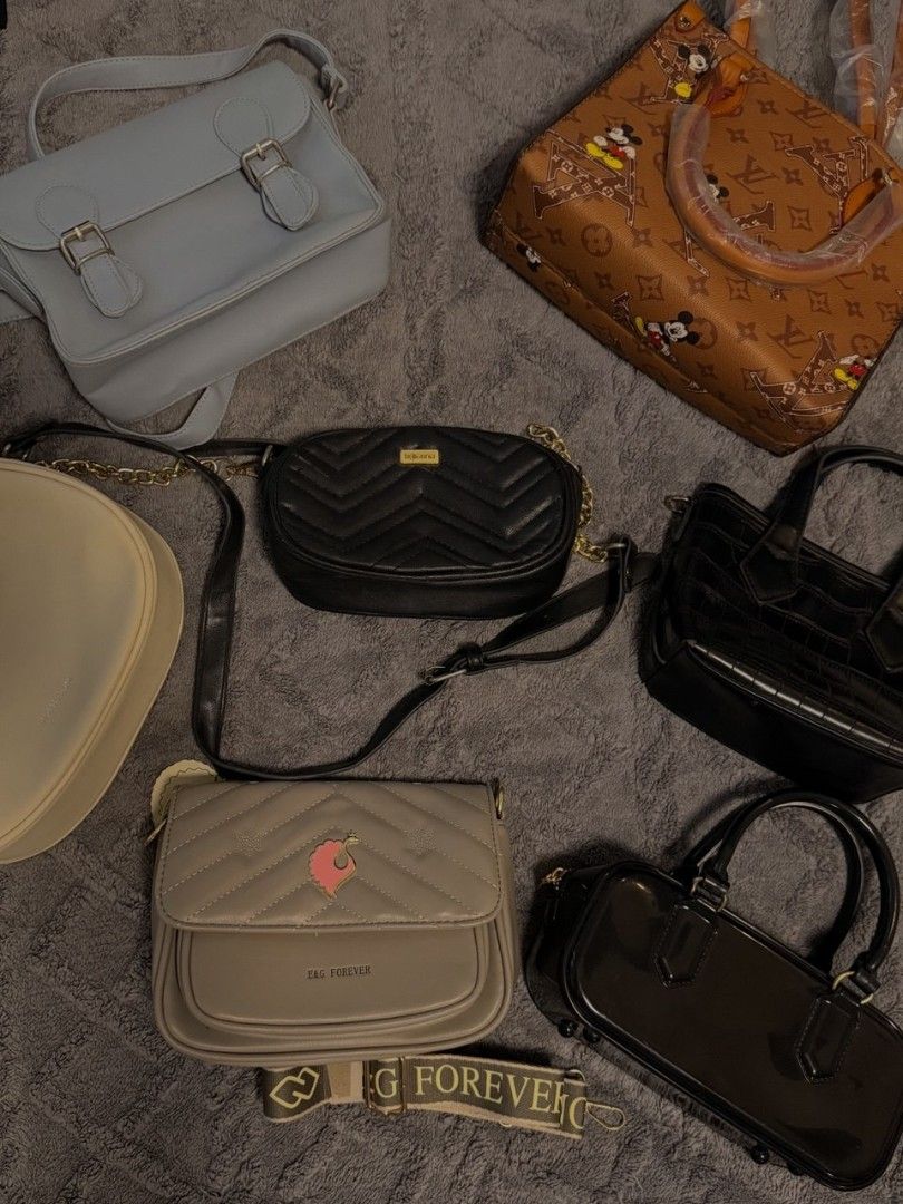 Assorted Handbags: Mickey Mouse, Quilted, and More (Category: Tote Bags) located in San Fernando. Submitted by pollygirl08 (Listing ID 1461745378, Image 1). Description: - Bundle of 6 cute handbags - Includes: Light blue satchel - Black chevron crossbody bag - Grey quilted bag with fun pink design - Black croc-effect top-handle bag - Clear black mini doctor bag - Brown tote with Mickey Mouse print - Great variety for different occasions.