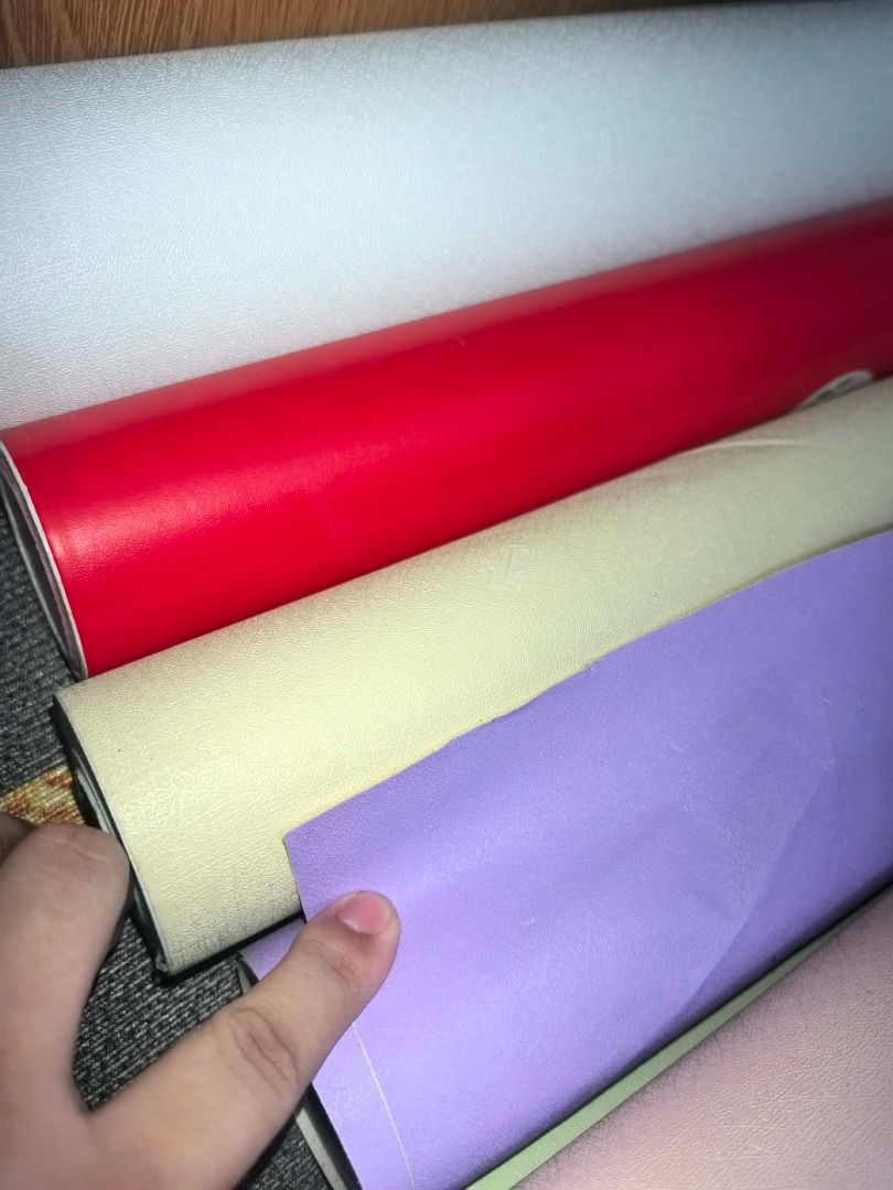 Assorted Wallpaper Rolls - Various Colors and Patterns (Category: Craft Supplies & Tools) located in Quezon City. Submitted by suzannegrace (Listing ID 1461768886, Image 2). Description: TAKE ALL - majority are not use, new new new - Assorted wallpaper rolls available - Colors: White, Red, Cream, Lavender, Pink, Light Green, Yellow, Green Patterned, Light Blue, Dark Blue - Some rolls feature a textured finish - Ideal for DIY projects and home red