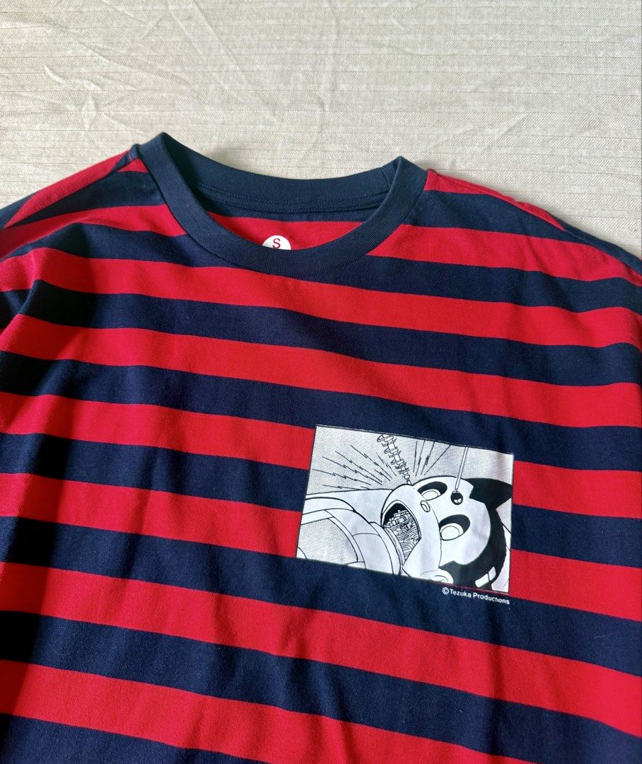 Astro Boy graphic patch ATOMOHYA Tezuka Productions. (Category: Dresses) located in Bayombong. Submitted by nica7 (Listing ID 1461701470, Image 2). Description: Can be dress or long top red and dark blue striped featuring an Astro Boy graphic patch labeled with © Tezuka Productions. Small on tag May fit s-l too.