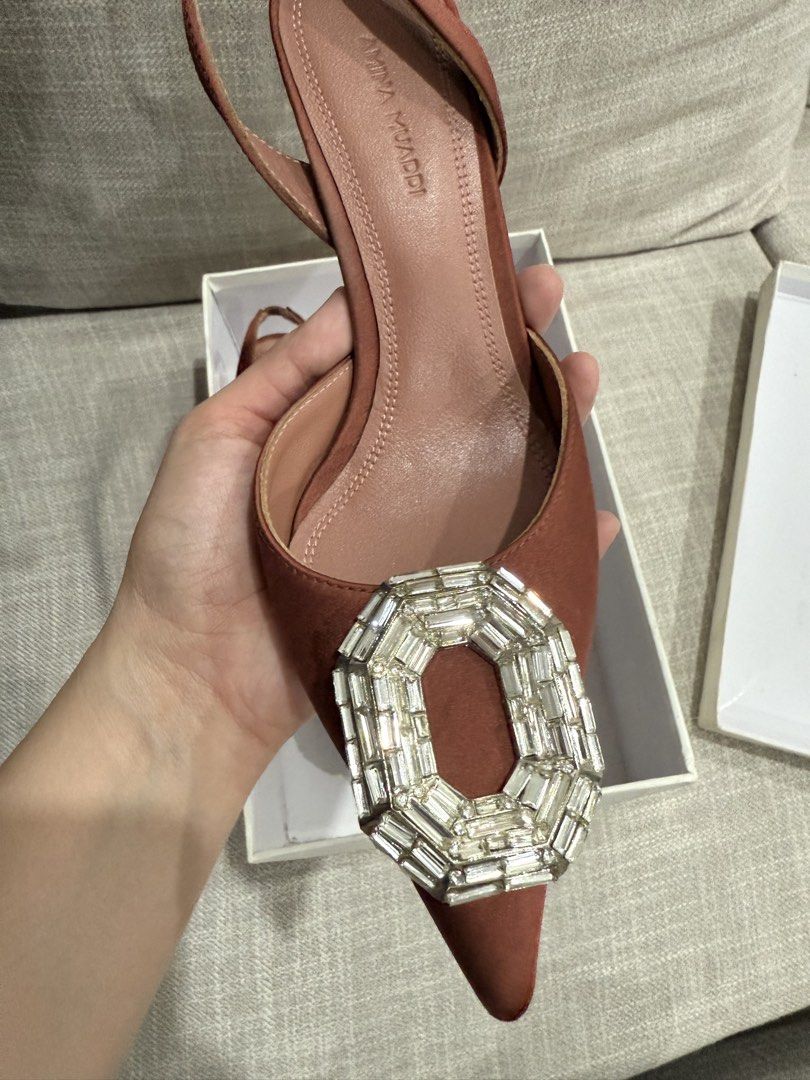 Authentic Amina Muaddi Slingback Heels (Category: Sneakers & Footwear) located in Manila. Submitted by echipmunk (Listing ID 1461710022, Image 2). Description: Authentic Amina Muaddi Slingback Heels Size 38 Shoes and box only (no dustbag, cards, etc) Worn once on my end Can check sole is still in very good condition Bought from another Carousell seller RFS declutterring high heels; in my tita phase already lol NEGOTIABLE Will block low ballers 🙏