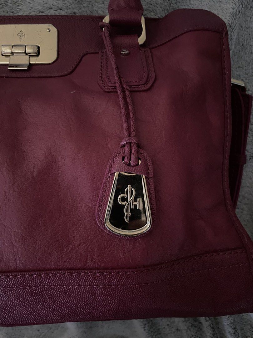 Authentic Cole Hann in Magenta Silver Hardware (Category: Cross-body Bags) located in Quezon City. Submitted by luckyg4l (Listing ID 1461565066, Image 3). Description: negotiable authentic see pics for flaws.