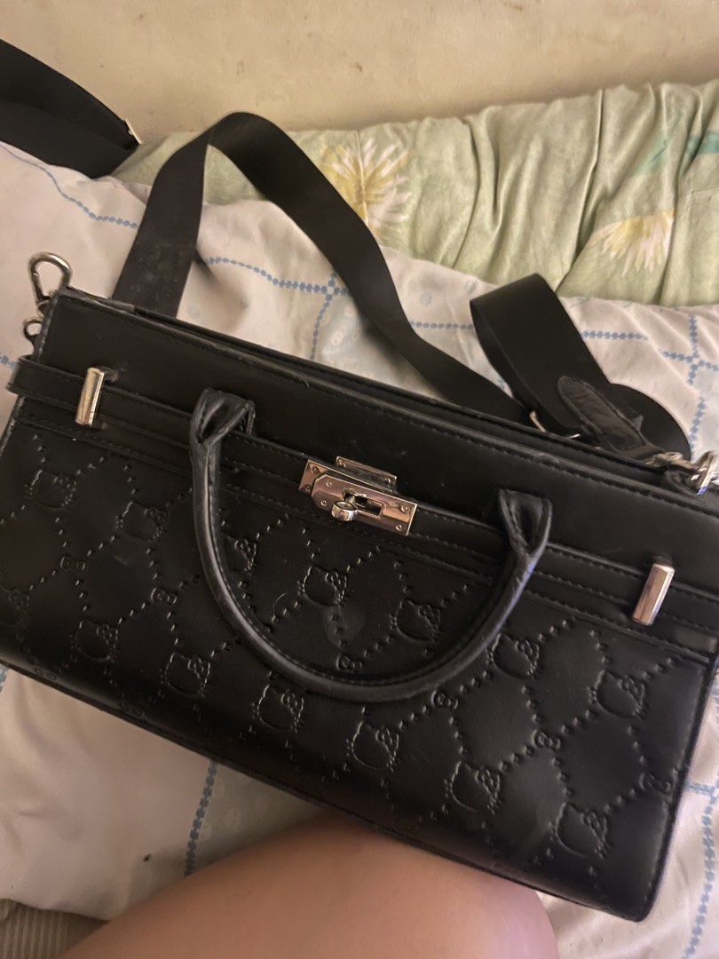 Authentic Hello Kitty in Black Sling Bag (Category: Cross-body Bags) located in Quezon City. Submitted by luckyg4l (Listing ID 1461570874, Image 1). Description: negotiable authentic bought from japan.