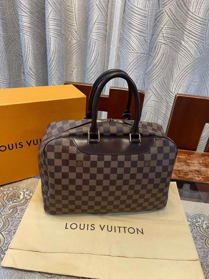 Authentic Louis Vuitton (Category: Luxury Bags & Wallets) located in Manila. Submitted by chloe_luxuries (Listing ID 1461716853, Image 2). Description: Guaranteed original Louis Vuitton Deauville in Damier Ebene Still in good condition Comes with dustbag and box Pm me for more details.
