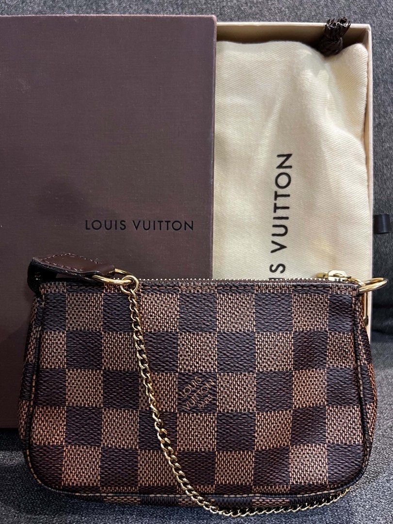 Authentic Louis Vuitton Mini Pochette (Category: Purses & Pouches) located in Tarlac. Submitted by kopi.roti (Listing ID 1461785848, Image 1). Description: .