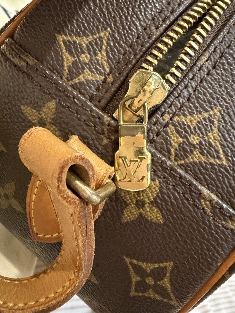 Authentic Louis Vuitton Monogram Canvas Crossbody Bag (Category: Luxury Bags & Wallets) located in Manila. Submitted by genyfurrose (Listing ID 1461655665, Image 3). Description: - Authentic Louis Vuitton crossbody bag - Classic monogram canvas - Gold hardware with LV logo zipper pull - Leather trim and strap - Zip closure for main compartment - Dust bag included - Ideal for everyday use.