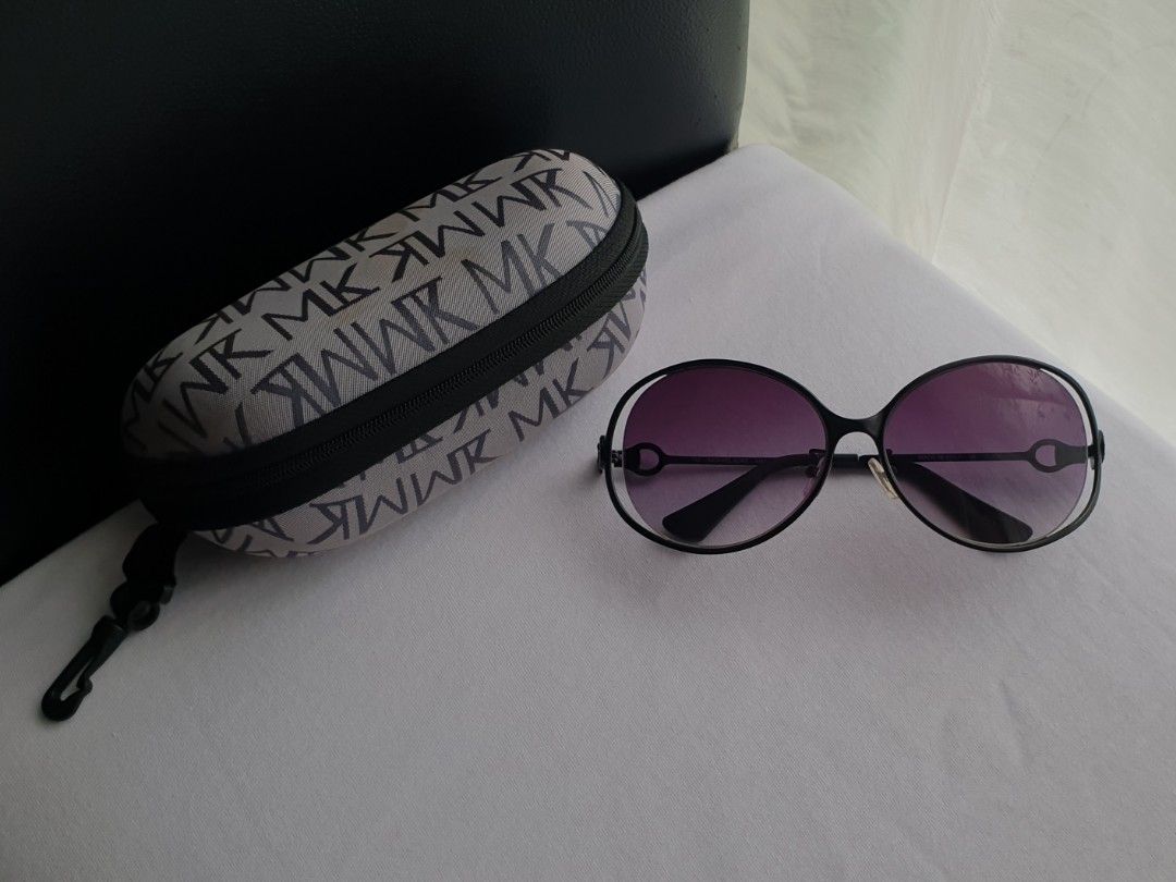 Authentic Michael Kors Sunglasses II (Category: Sunglasses & Eyewear) located in Quezon City. Submitted by WasalakTwo (Listing ID 1461753227, Image 1). Description: Bought in Korea Goodcondition Clean and presentable Minimal signs of usage Open for delivery nationwide.
