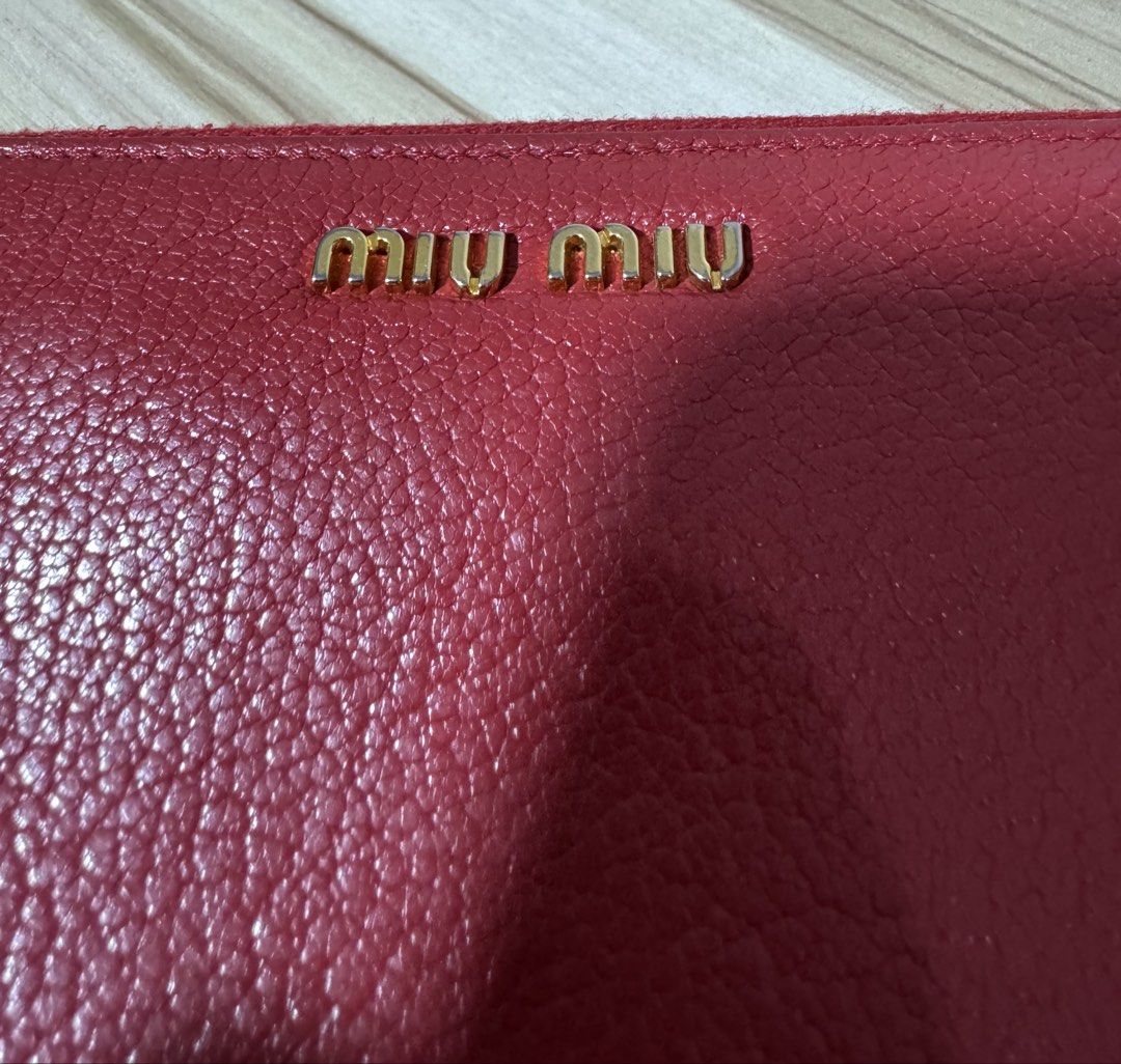 Authentic Miu Wallet (Category: Luxury Bags & Wallets) located in Quezon City. Submitted by rych0799 (Listing ID 1461702325, Image 2). Description: It has serial code can send thru chat. 9/10 condition.