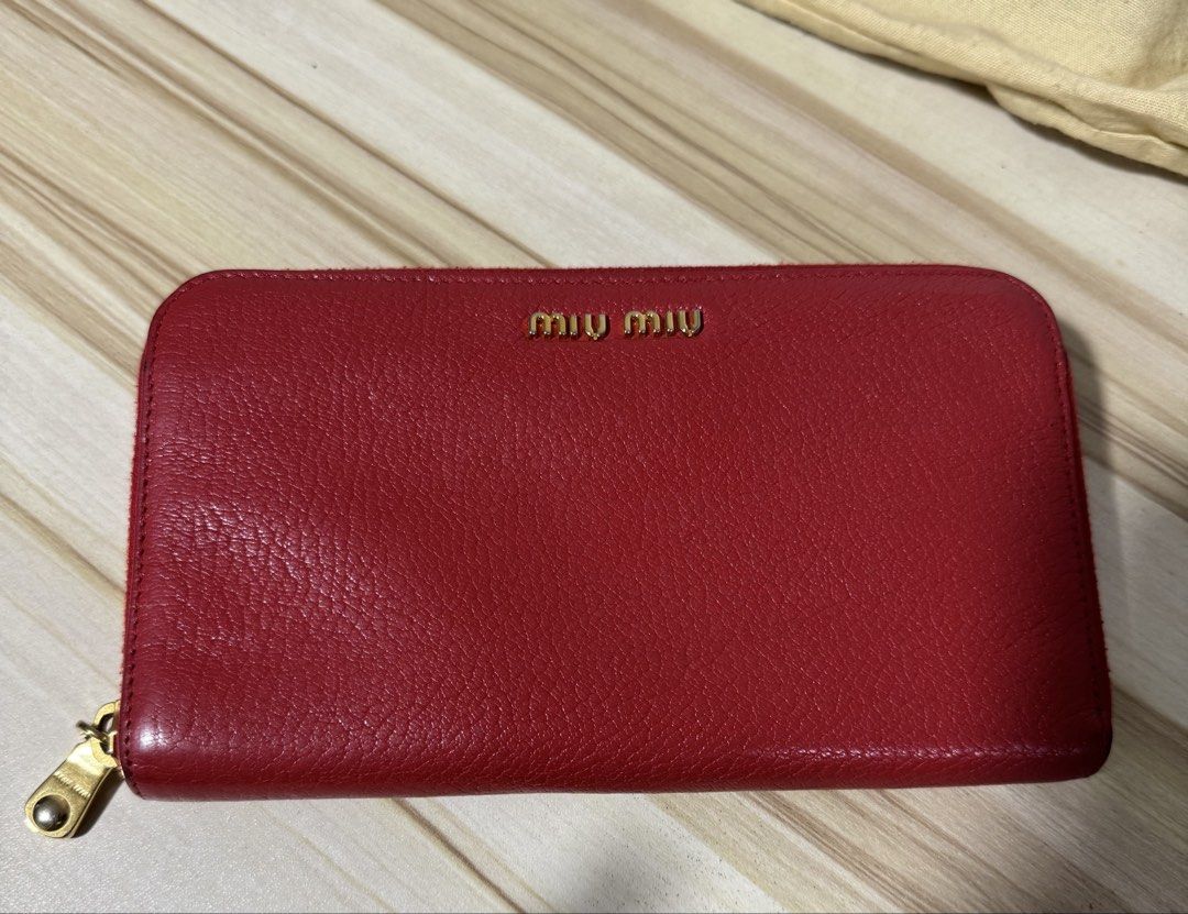 Authentic Miu Wallet (Category: Luxury Bags & Wallets) located in Quezon City. Submitted by rych0799 (Listing ID 1461702325, Image 1). Description: It has serial code can send thru chat. 9/10 condition.