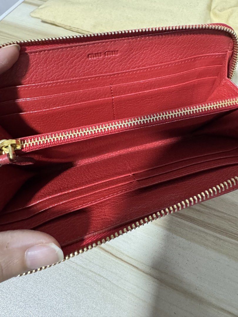 Authentic Miu Wallet (Category: Luxury Bags & Wallets) located in Quezon City. Submitted by rych0799 (Listing ID 1461702325, Image 3). Description: It has serial code can send thru chat. 9/10 condition.