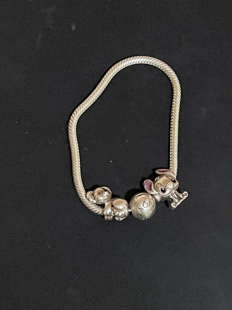 Authentic Pandora Bracelet + 2 Charms Set (Category: Bracelets) located in Caloocan City. Submitted by fiercepenguin.953822 (Listing ID 1461748093, Image 2). Description: Authentic Pandora Bracelet + 2 Charms Set Selling as a complete pre-loved bundle! Perfect starter set or gift. Includes: Pandora Moments Snake Chain Bracelet (Sterling Silver) Disney Lilo & Stitch Charm (Authentic / Enamel Detail) Koala Charm (Sterling Silver) Condition: Pre-lov