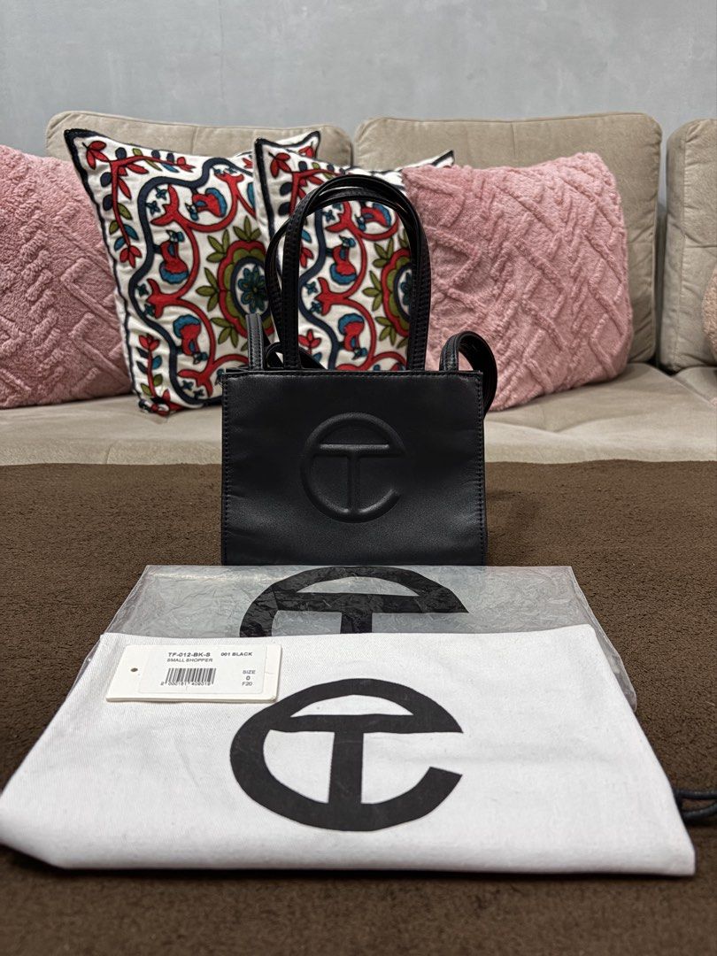 Authentic Telfar Black Shopping Bag (Small) (Category: Tote Bags) located in Pasig City. Submitted by pat.soriano (Listing ID 1461657340, Image 1). Description: I’m selling my authentic Telfar black Shopping Bag in small size. Bought last 2022 from the official Telfar USA website. Its original price was $150 (₱9,300) excluding shipping and tax. Condition: Like New. The bag is in excellent condition with no issues. Reason for selling: I rarely use