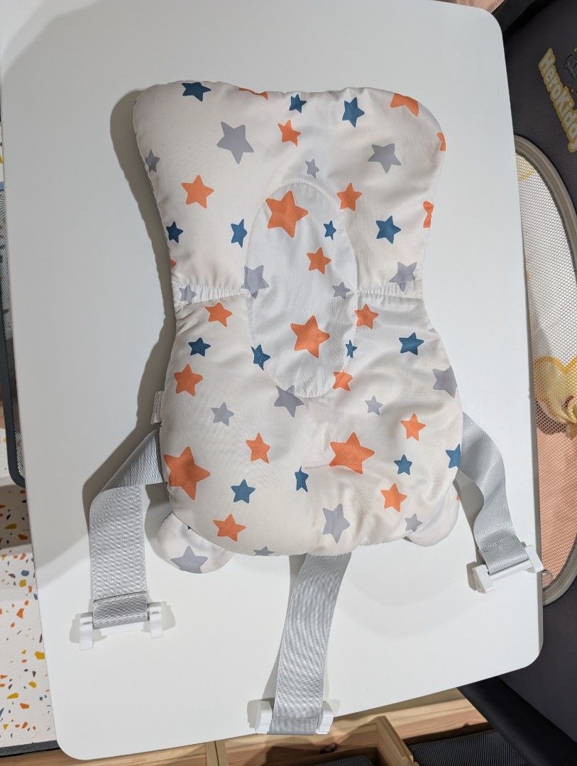 Baby Bath Support Pillow with Straps (Category: Bathtub & Bath Accessories) located in Manila. Submitted by coolshark888 (Listing ID 1461593360, Image 2). Description: - Soft padded pillow for baby's bath time - Features secure straps to keep baby safe - Reversible design: white with stars on one side, grey mesh on the other - Ensures baby's comfort and safety in the tub - Easy to use and clean.