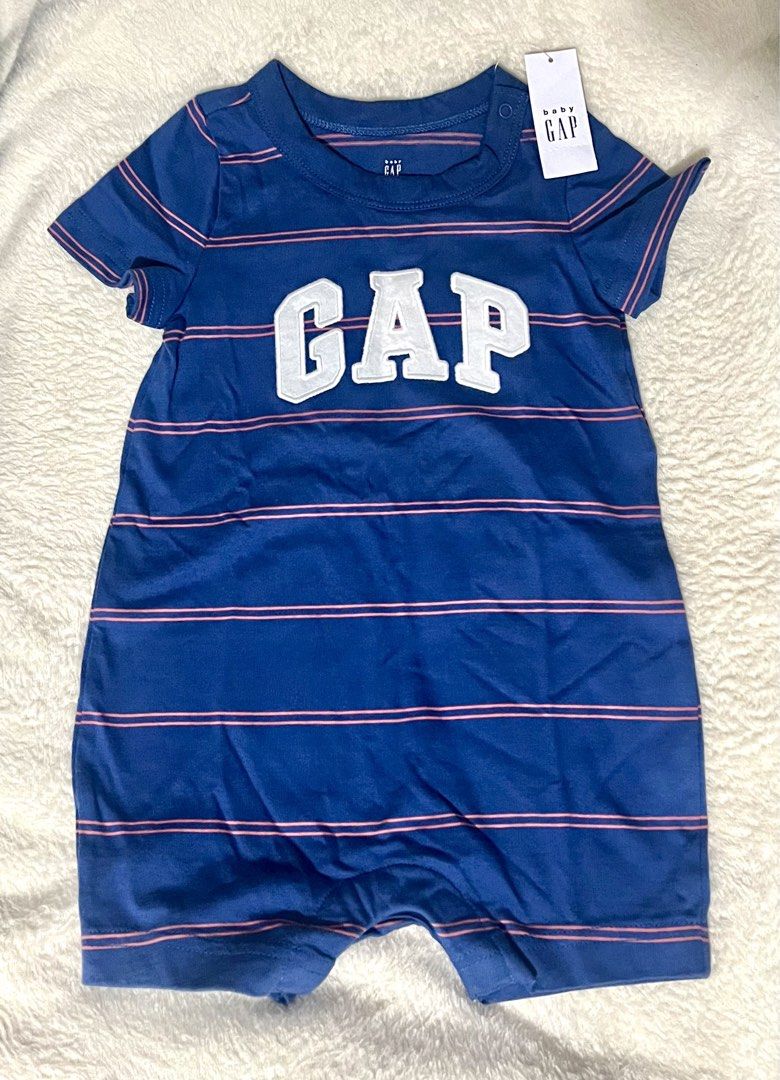 Baby Gap Blue Striped Romper 12-18 Months (Category: Babies & Kids Fashion) located in Las Pinas. Submitted by lovedbydgarcia (Listing ID 1461606196, Image 1). Description: - Cute blue and pink striped baby romper - Brand: Gap - Size: 12-18 months - Short sleeves and short legs - Features Gap logo across the chest - Perfect for your little one.