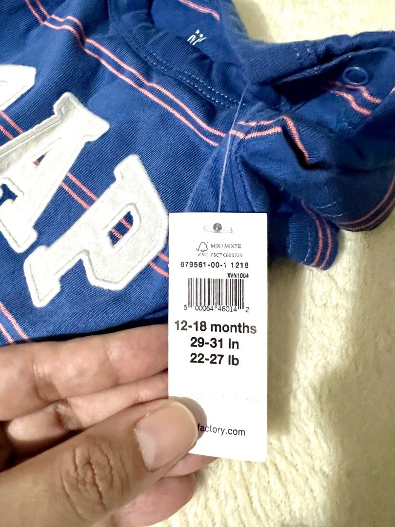 Baby Gap Blue Striped Romper 12-18 Months (Category: Babies & Kids Fashion) located in Las Pinas. Submitted by lovedbydgarcia (Listing ID 1461606196, Image 2). Description: - Cute blue and pink striped baby romper - Brand: Gap - Size: 12-18 months - Short sleeves and short legs - Features Gap logo across the chest - Perfect for your little one.