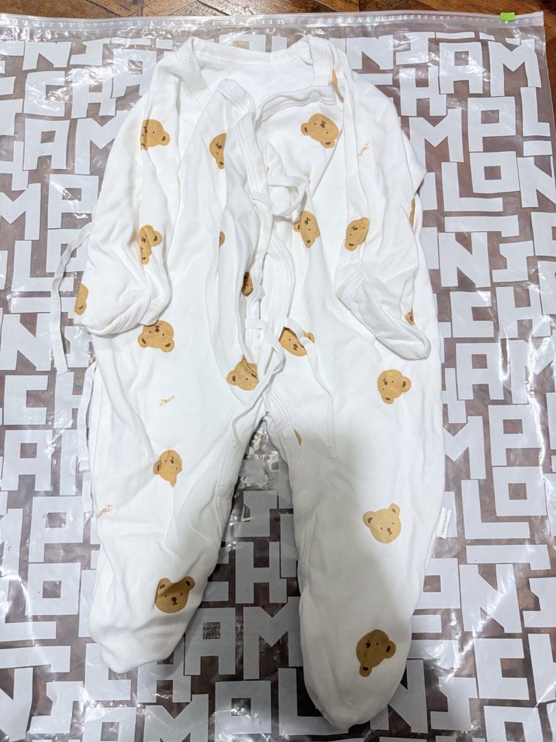 Baby Rompers - Teddy Bear, Dinosaur, Elephant Prints (Category: Babies & Kids Fashion) located in Makati City. Submitted by lesslaystreet (Listing ID 1461746430, Image 1). Description: - Set of 3 cute baby rompers - Adorable white designs with fun prints: teddy bear, dinosaurs, and elephants - Easy tie-up closure for quick dressing - Made from soft fabric for ultimate baby comfort - Ideal for everyday wear, playtime, or sleep Hindi nagamit.