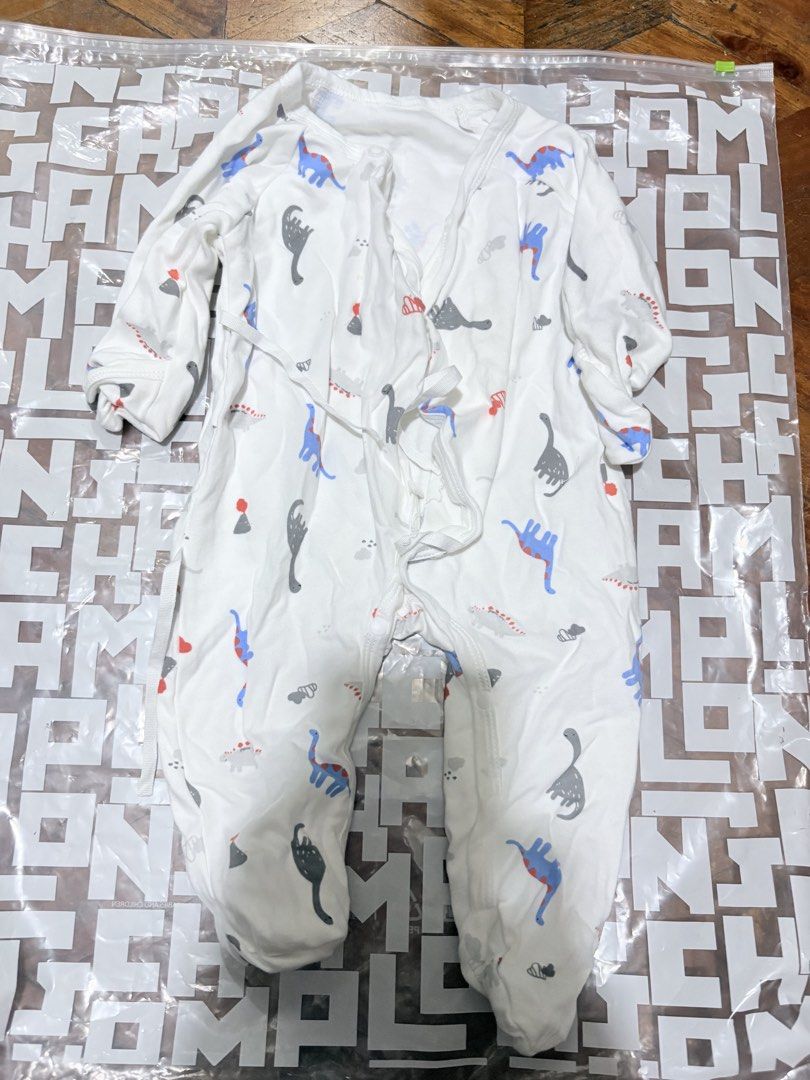 Baby Rompers - Teddy Bear, Dinosaur, Elephant Prints (Category: Babies & Kids Fashion) located in Makati City. Submitted by lesslaystreet (Listing ID 1461746430, Image 2). Description: - Set of 3 cute baby rompers - Adorable white designs with fun prints: teddy bear, dinosaurs, and elephants - Easy tie-up closure for quick dressing - Made from soft fabric for ultimate baby comfort - Ideal for everyday wear, playtime, or sleep Hindi nagamit.