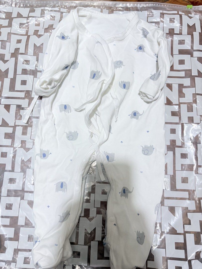 Baby Rompers - Teddy Bear, Dinosaur, Elephant Prints (Category: Babies & Kids Fashion) located in Makati City. Submitted by lesslaystreet (Listing ID 1461746430, Image 3). Description: - Set of 3 cute baby rompers - Adorable white designs with fun prints: teddy bear, dinosaurs, and elephants - Easy tie-up closure for quick dressing - Made from soft fabric for ultimate baby comfort - Ideal for everyday wear, playtime, or sleep Hindi nagamit.