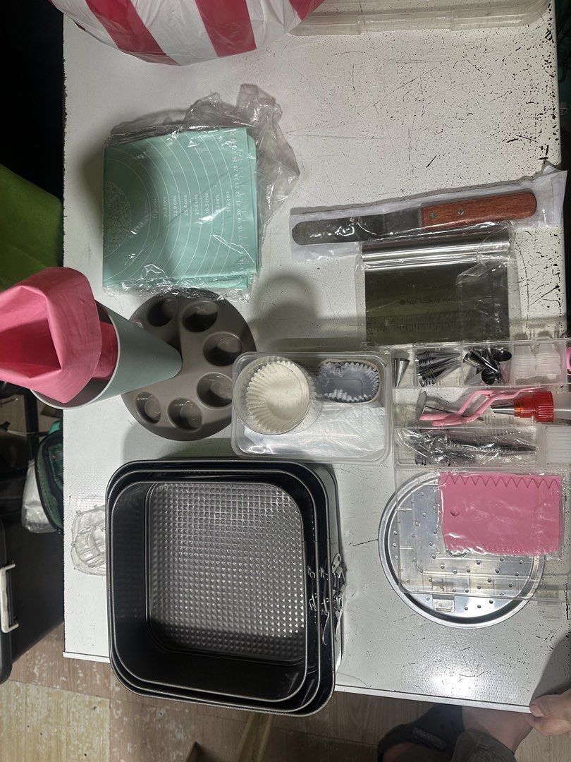 Baking Tools Set - Square Cake Pans, Piping Bags, Molds (Category: Bakeware) located in Manila. Submitted by zuripot0726 (Listing ID 1461723555, Image 2). Description: - Complete baking tool set perfect for home bakers. - Includes square cake pans for your baking creations. - Comes with piping bags and various decorating tips for beautiful designs. - Features a handy silicone baking mat. - Includes a set of cupcake liners. - Some items are brand 