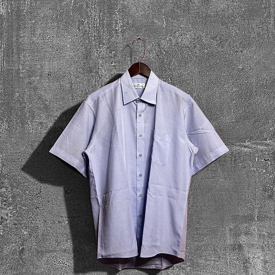 Balenciaga Paris Button down (Category: Formal Shirts) located in Quezon City. Submitted by donklasiko (Listing ID 1461581109, Image 1). Description: Condition: 9.5+/10 Pristine condition Issue: non Refer to the dimension 🤗 PM FOR MORE DETAILS NO RETURN, NO EXCHANGE & NO REFUND! ✅I ALSO ACCEPT TRADE/SWAP TO ANYTHING JUST DROP YOUR OFFER Please manage your expectations, this is a secondhand item. What you see is what you get 😊 💵MOP: GCASH, BDO 