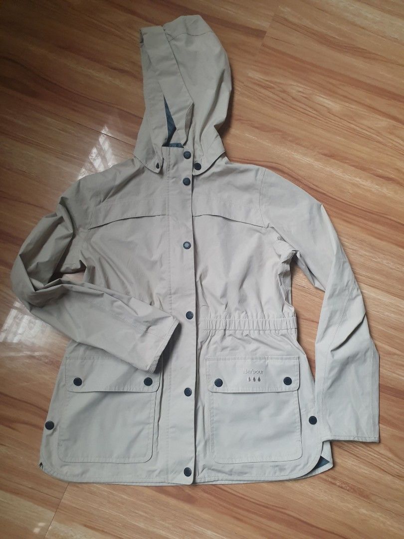 Barbour women's lightweight, showerproof utilitarian jacket (Category: Coats, Jackets and Outerwear) located in Makati City. Submitted by nvdluxurygoods (Listing ID 1461664789, Image 1). Description: Barbour women's lightweight, showerproof utilitarian jacket, typically finished in a light neutral shade like stone, sand, or mist..