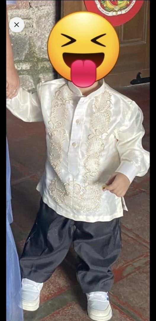 Barong set (Category: Babies & Kids Fashion) located in Taguig. Submitted by maryankenn (Listing ID 1461696681, Image 1). Description: - Cream-colored Barong Tagalog for kids - Features intricate embroidery on the front - Comes with matching black pants - Ideal for formal events and special occasions - Perfect for young boys.