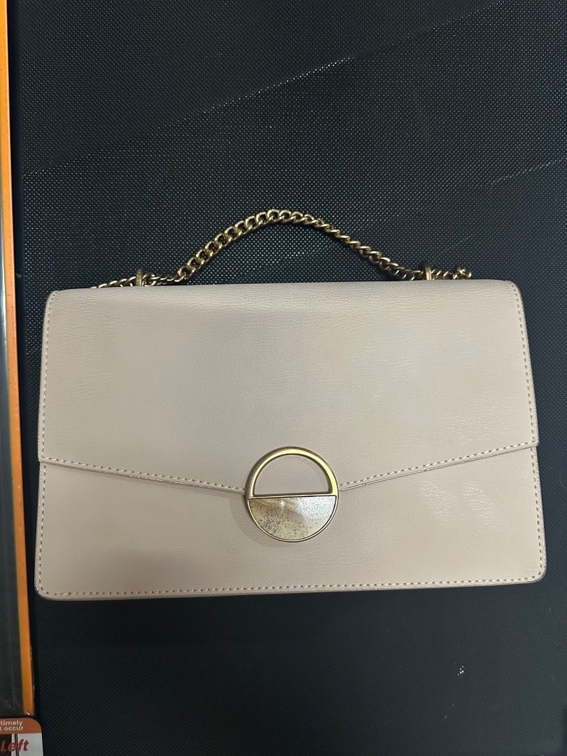 Light Pink Chain Shoulder Bag with Gold Hardware (Category: Shoulder Bags) located in Manila. Submitted by the.perrenial.pixie (Listing ID 1461702552, Image 1). Description: Description: - Light pink shoulder bag with chain strap - magnetic snap closure - Convenient interior card slots - Measurements in the pictures - has been in storage for years RFS: declutter. Used only twice .