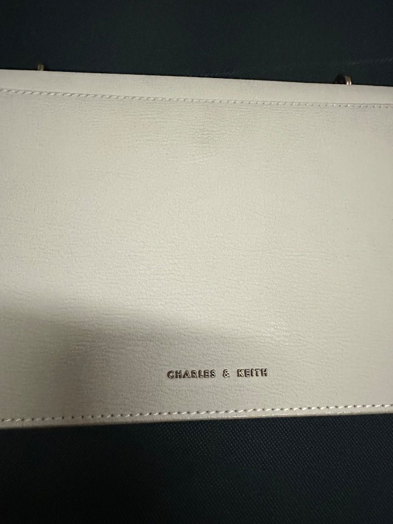 Light Pink Chain Shoulder Bag with Gold Hardware (Category: Shoulder Bags) located in Manila. Submitted by the.perrenial.pixie (Listing ID 1461702552, Image 3). Description: Description: - Light pink shoulder bag with chain strap - magnetic snap closure - Convenient interior card slots - Measurements in the pictures - has been in storage for years RFS: declutter. Used only twice .