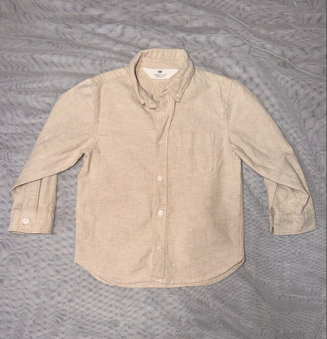 Beige Polo (Category: Babies & Kids Fashion) located in Caloocan City. Submitted by mrynn_declutter (Listing ID 1461626052, Image 1). Description: Fits 2-4 yo.