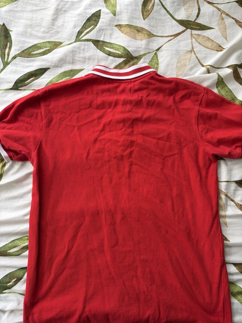 Bench Red Polo Shirt (Category: Tshirts & Polo Shirts ) located in Manila. Submitted by 1vktry (Listing ID 1461604478, Image 2). Description: - Bought from Philippines - Length: 19 inches - Width: 25 inches - Lightly Used but no damages - Can only do delivery Via lalamove.