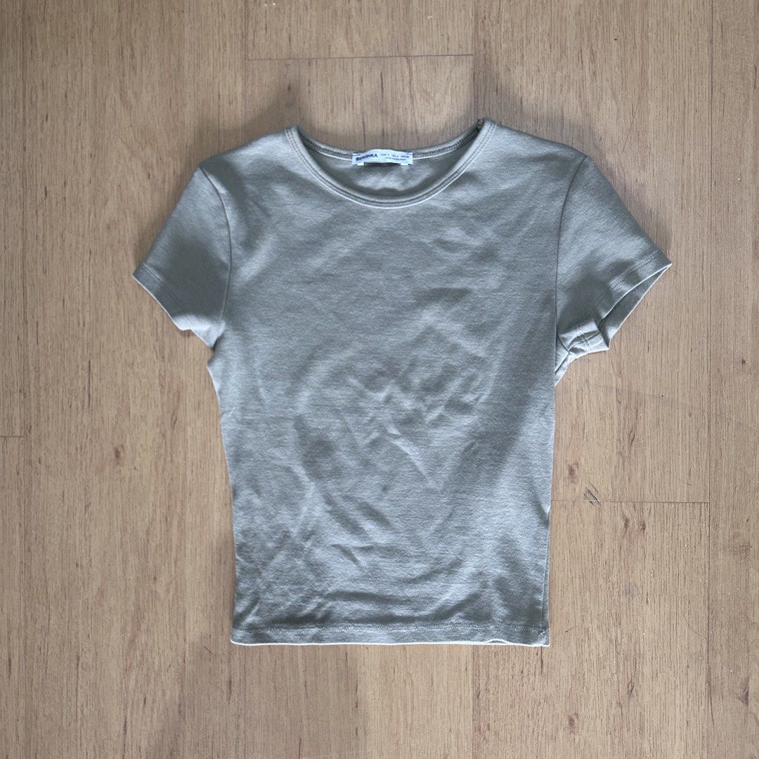 Bershka Green Fitted Top (Category: Shirts) located in Cabuyao City. Submitted by hyugaclan (Listing ID 1461659501, Image 1). Description: .