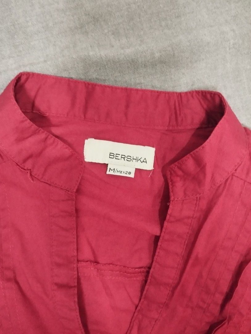 Bershka Red Button-Up Shirt M/MEX28 (Category: Shirts) located in Dagupan City. Submitted by nahamul_1508 (Listing ID 1461740817, Image 2). Description: - Bershka red button-up shirt - Mandarin collar with button details - Long sleeves - Size: M / MEX28 - Versatile for casual or dressed-up occasions .