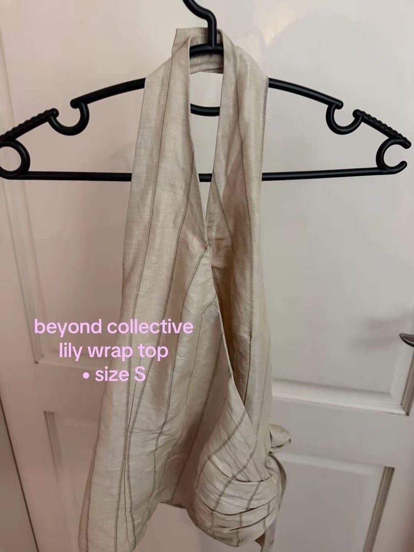 Beyond Collective Lily Wrap Top Size S (Category: Blouses) located in Manila. Submitted by kingchocnut (Listing ID 1461569370, Image 2). Description: - Bought for ₱1,429 - Used once!! - Style: Lily wrap top - Neckline: Halter neck - Waist: Tie waist - Size: S.