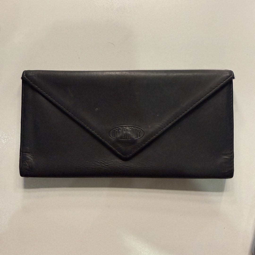 Big Skinny Black Leather Envelope Wallet (Category: Wallets & Card holders) located in Pateros City. Submitted by sachiereyes (Listing ID 1461770721, Image 1). Description: - Black leather wallet - Envelope style with V-shaped flap closure - Zippered pocket on the back - Shows some signs of wear on corners and edges - Leather is soft with some creasing.