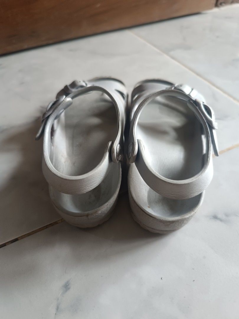 Birkenstock Silver Strap Sandals (Category: Flats & Sandals) located in Naga. Submitted by elzza_zenitram (Listing ID 1461624181, Image 3). Description: - Silver Birkenstock sandals - Two adjustable buckle straps across the front - Heel strap for a secure fit - Soles with good grip, perfect for everyday wear - Minor signs of use on footbed and straps 19cm insole.