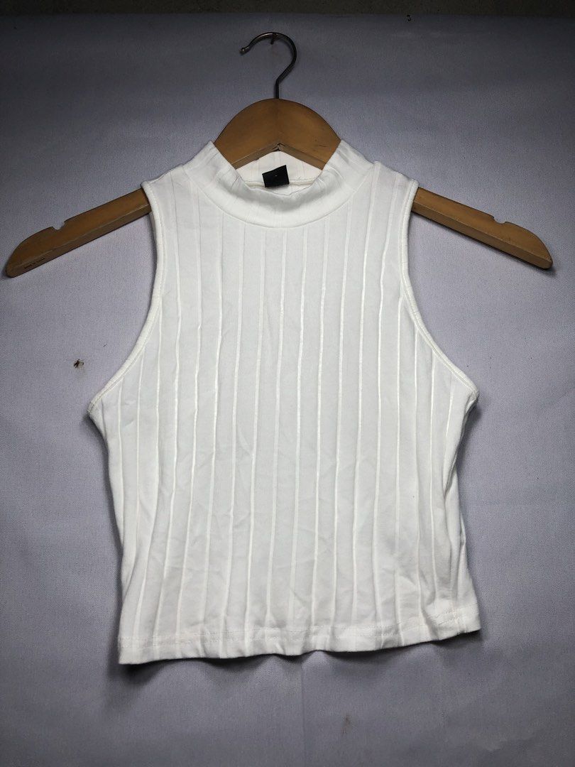 White ribbed mock-neck tank top (Category: Others Tops) located in Cagayan de Oro. Submitted by itzme_cing (Listing ID 1461687938, Image 1). Description: .
