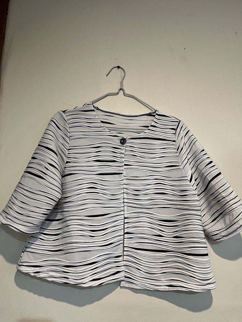 Black & White Structured Cardigan (Category: Coats, Jackets and Outerwear) located in Caloocan City. Submitted by towtsph (Listing ID 1461595307, Image 1). Description: - Structured black and white cardigan - Unique wavy stripe pattern - Single button closure - 3/4 sleeves - Freesize fit - Ideal for layering over tops.