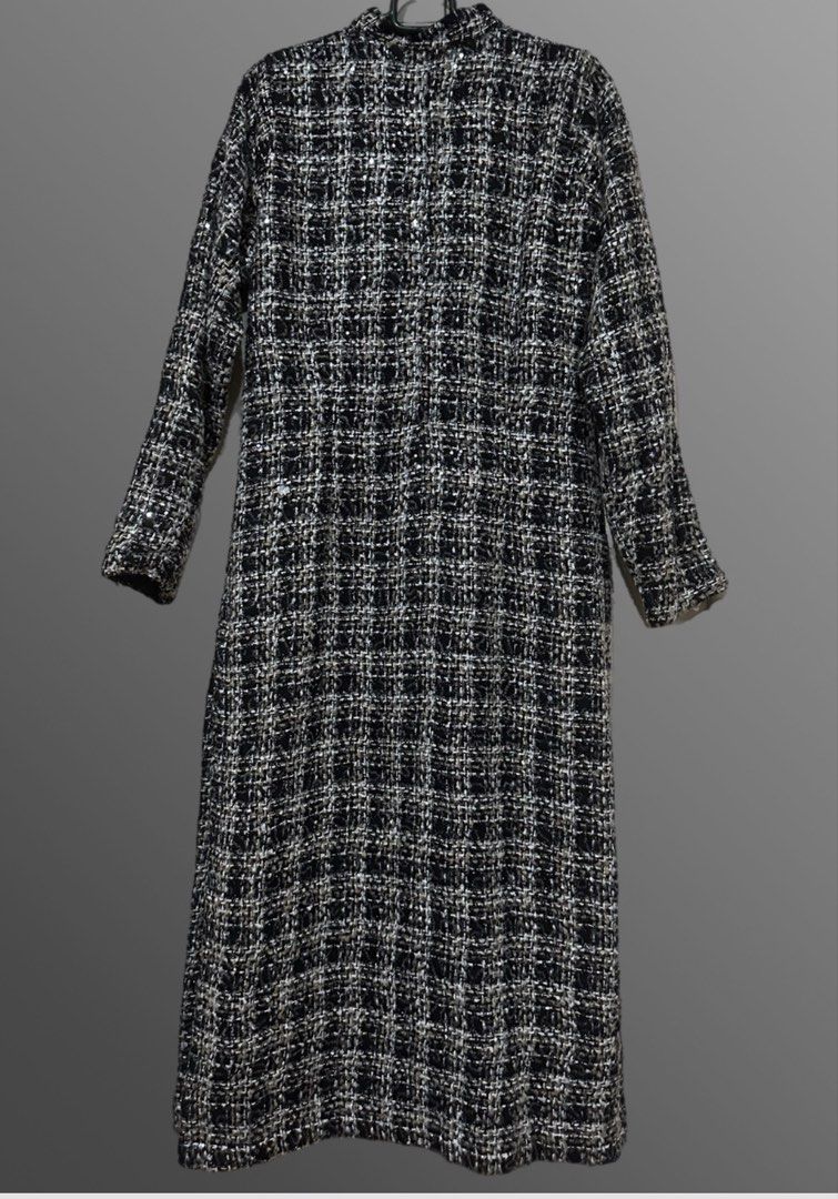 Black & White Tweed Dress with Sequins (Category: Dresses) located in Makati City. Submitted by allexxii (Listing ID 1461675893, Image 2). Description: - Elegant long sleeve tweed dress - Classic black, white, and beige checkered pattern - Subtle sequins woven in for a touch of sparkle - Sophisticated high neckline with a small cutout - Versatile for dressing up or down - Effortlessly chic and sophisticated look -Length by 50 inches -Sleeve lengt