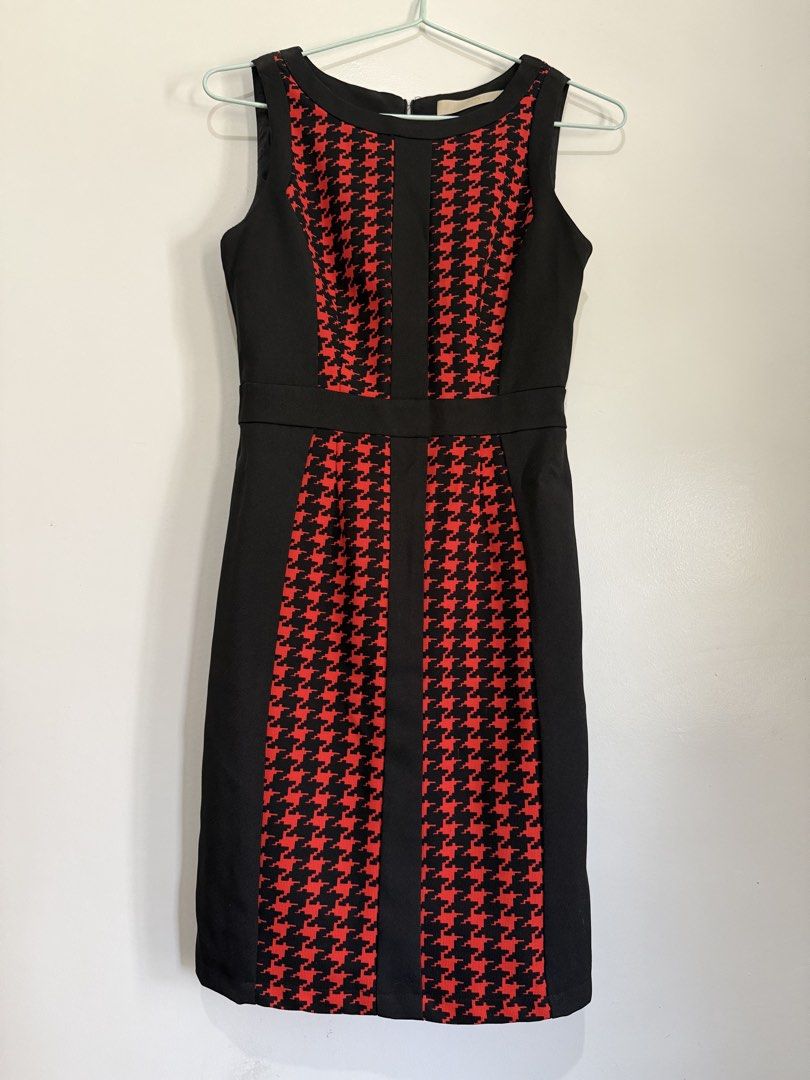 Black and Red Houndstooth Sheath Dress (Category: Dresses) located in Laoag. Submitted by rhedgejasm73385 (Listing ID 1461693304, Image 2). Description: - Sleeveless sheath dress - Black base with red & black houndstooth pattern panels - Zipper closure at the back - Knee-length - Ideal for work or smart casual events.