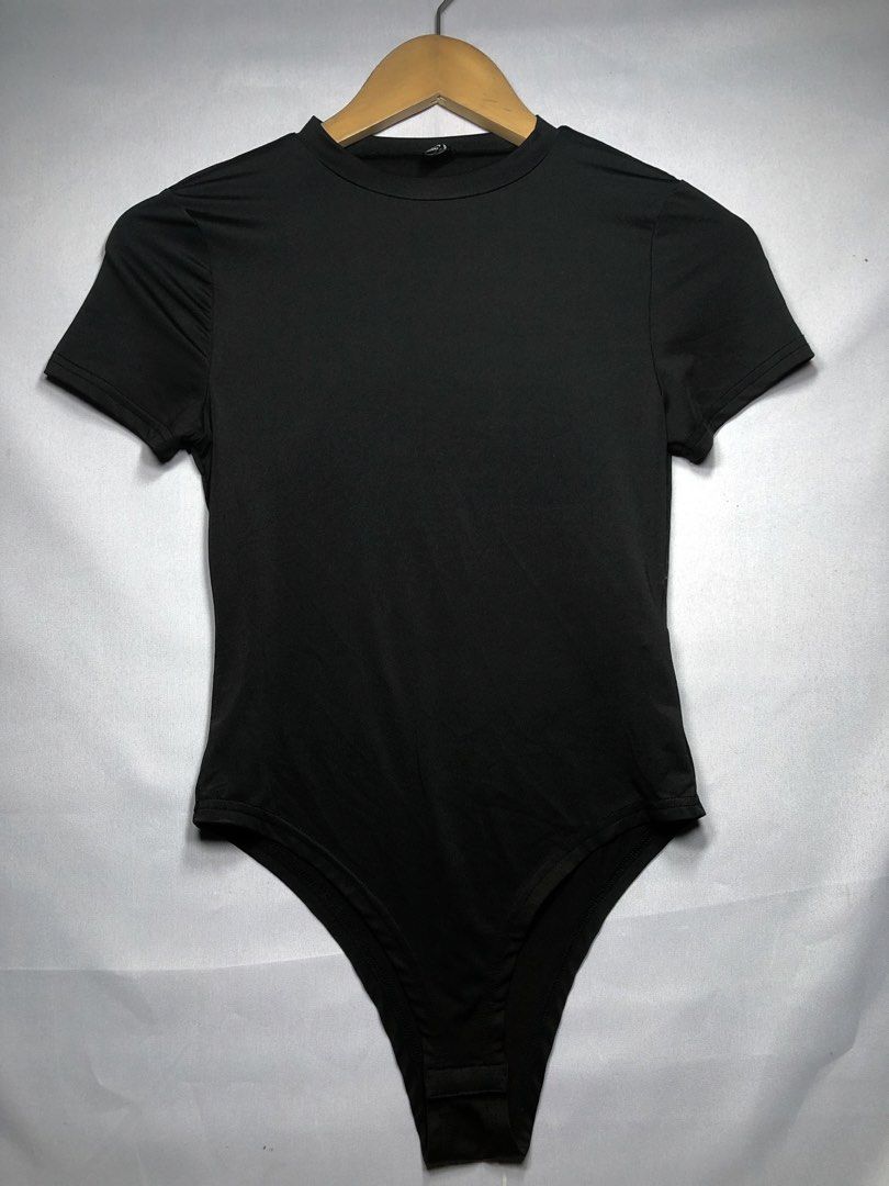 Black short-sleeve round-neck bodysuit (Category: Shirts) located in Cagayan de Oro. Submitted by itzme_cing (Listing ID 1461685100, Image 1). Description: .