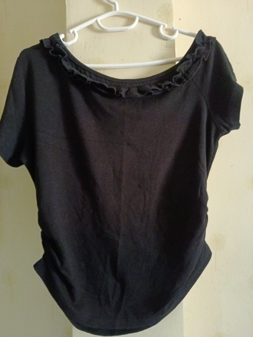 Black asymmetrical top (Category: Blouses) located in Las Pinas. Submitted by erikashoppe (Listing ID 1461589410, Image 1). Description: armpit to armpit 17-18in length 20in.