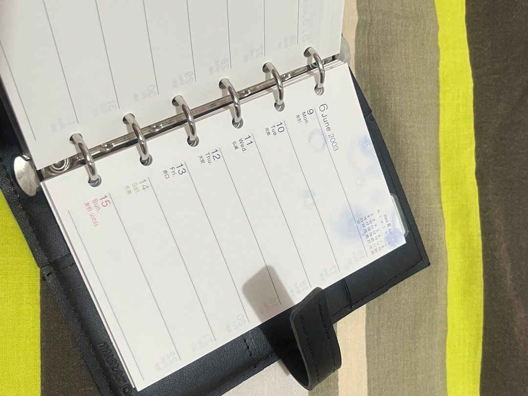Black Binder Planner with 2023 Schedule Inserts (Category: Stationery & School Supplies) located in Santa Rosa. Submitted by rsxyen (Listing ID 1461702622, Image 3). Description: - Black binder planner - Includes 2023 schedule pages - Some pages feature cute floral stamps - Plenty of space for notes and daily planning - Ready for your organization needs.