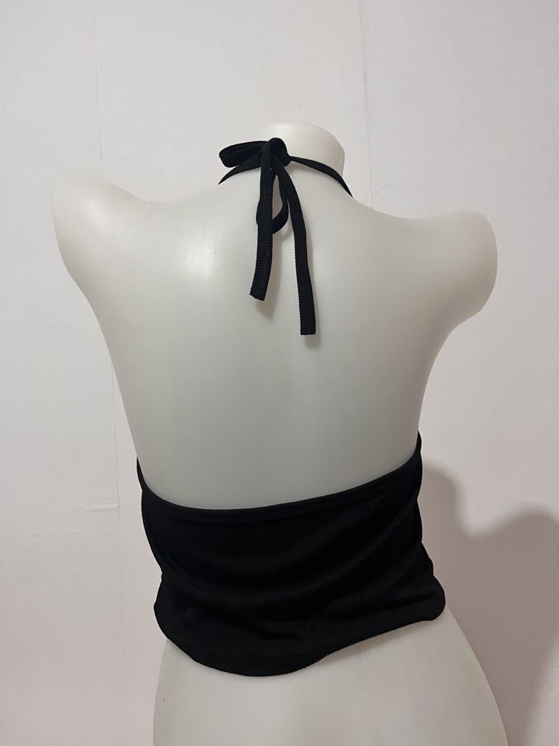 Black Cat Face Halter Crop Top (Category: Sleeveless) located in Manila. Submitted by chimcheese (Listing ID 1461582405, Image 2). Description: - Cute black halter crop top - White cat face design - Ribbed material for a comfortable fit - Ties at the neck and back for adjustable styling - Versatile for casual wear or a night out - Fun and playful style.