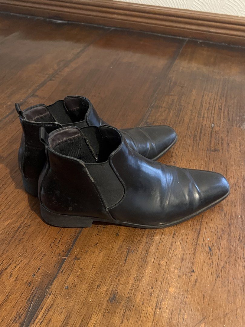 Black Chelsea Boots US 7 (Category: Boots) located in Pasig City. Submitted by martin.as (Listing ID 1461632526, Image 2). Description: - Classic black Chelsea boots - Easy slip-on design with elasticated sides - Stylish pointed toe - Soles show some wear but retain good grip - Versatile for everyday wear or dressing up.