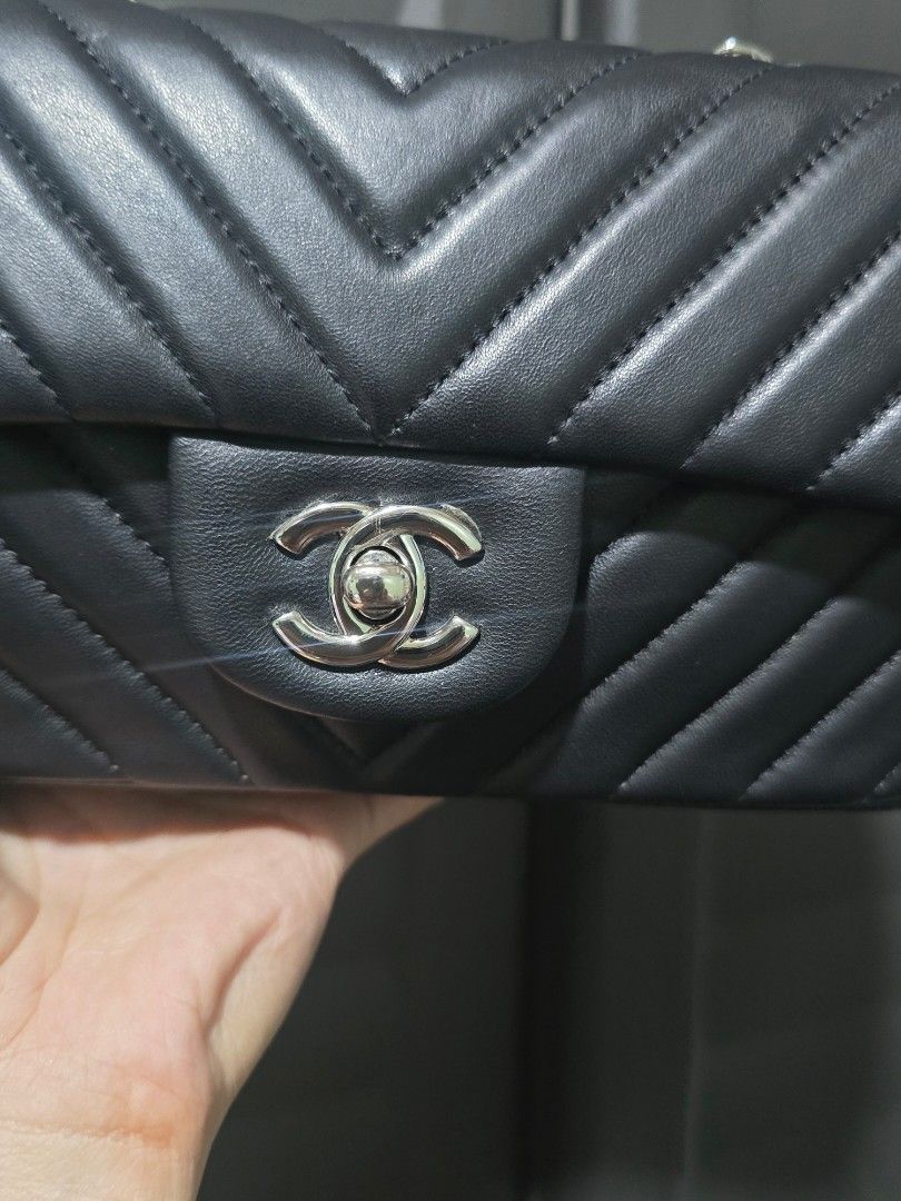 Black Chevron Leather Shoulder Bag with Silver CC Lock (Category: Luxury Bags & Wallets) located in Manila. Submitted by muliph (Listing ID 1461593799, Image 3). Description: - Classic black shoulder bag - Elegant chevron quilting - Signature silver CC turn-lock closure - Versatile chain strap - Smooth, high-quality leather - Spacious interior for essentials - Ideal for both casual and formal outfits.