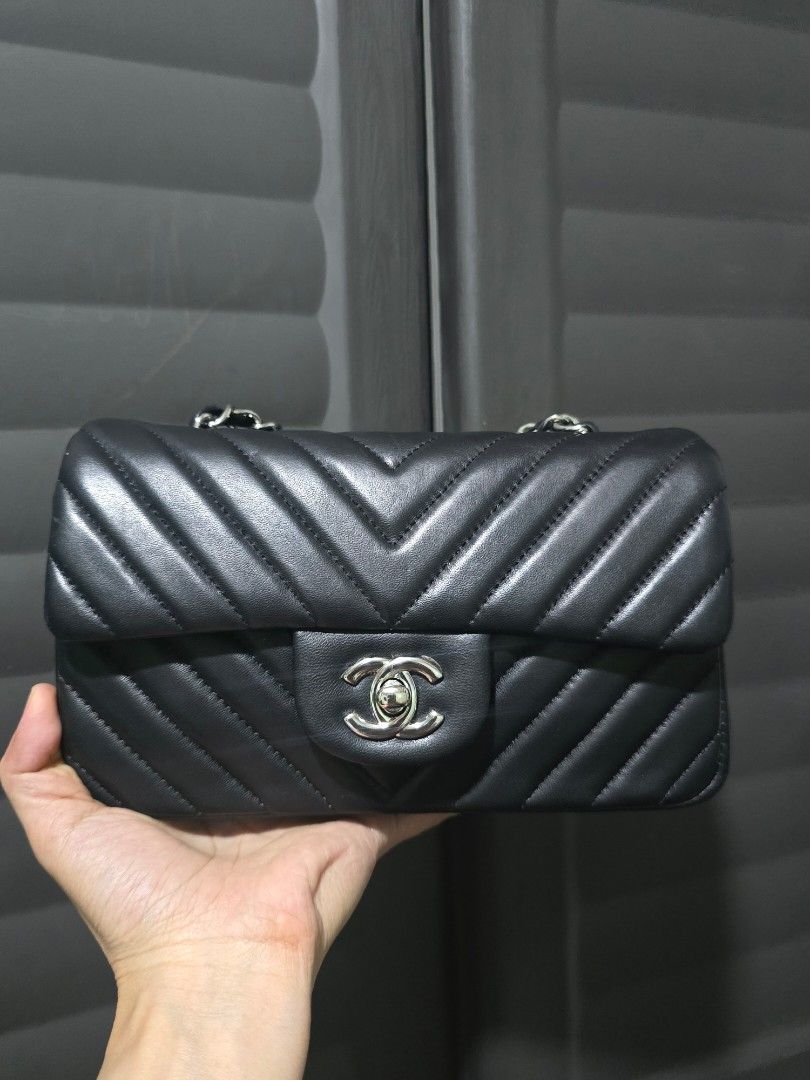 Black Chevron Leather Shoulder Bag with Silver CC Lock (Category: Luxury Bags & Wallets) located in Manila. Submitted by muliph (Listing ID 1461593799, Image 2). Description: - Classic black shoulder bag - Elegant chevron quilting - Signature silver CC turn-lock closure - Versatile chain strap - Smooth, high-quality leather - Spacious interior for essentials - Ideal for both casual and formal outfits.